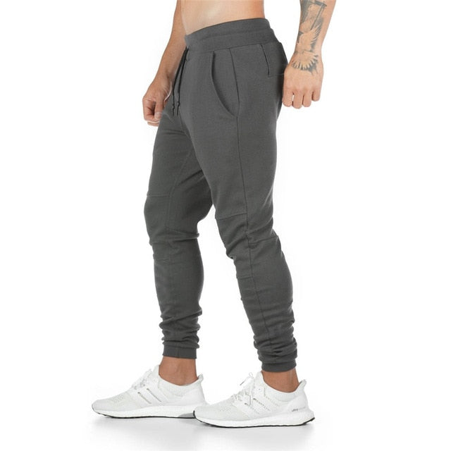 Jogging gris avec poche pour téléphone portable pour crossfit, calisthenics ou fitness