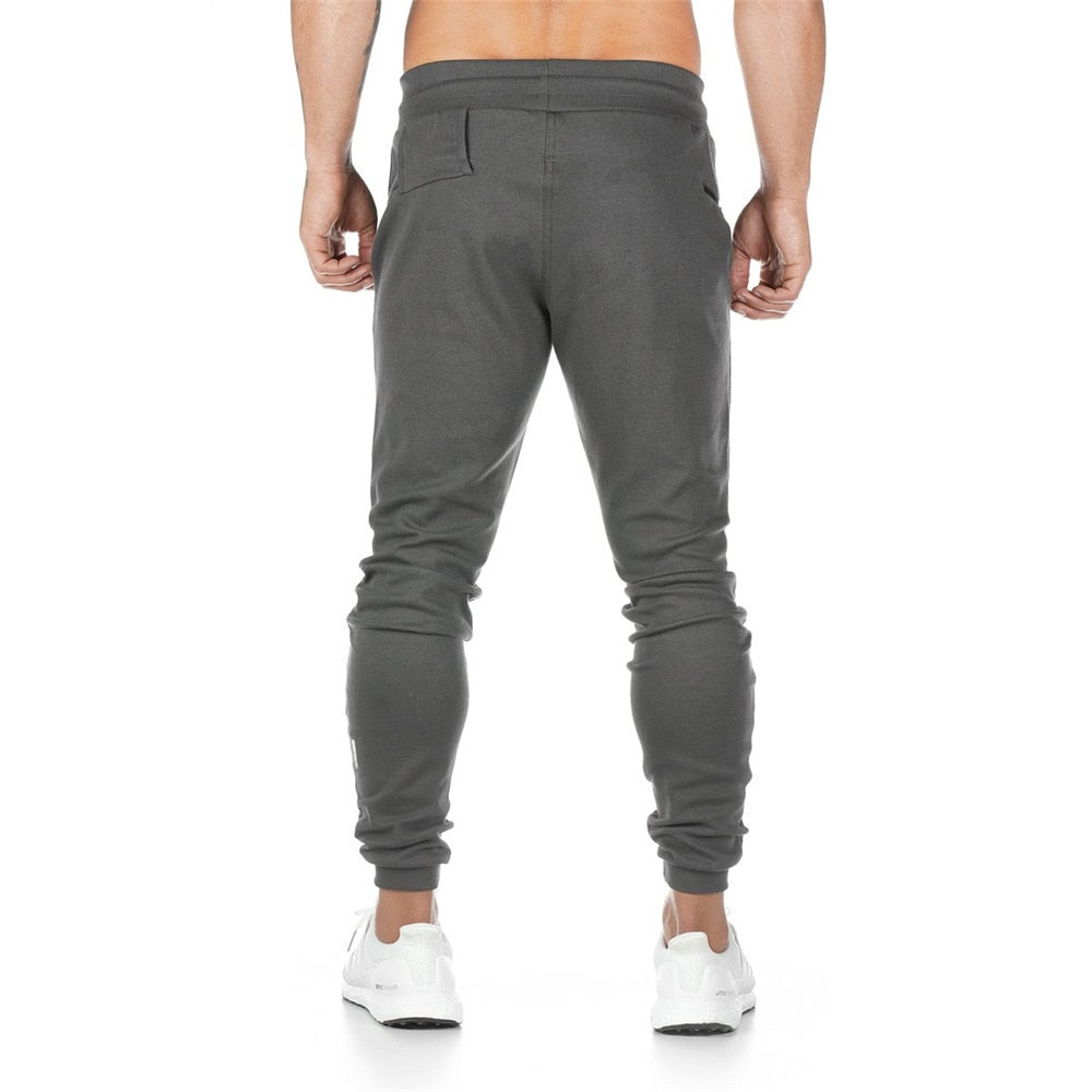 Jogging gris avec poche pour téléphone portable pour crossfit, calisthenics ou fitness